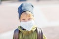 A small boy in protectionÃÂ mask outdoor Royalty Free Stock Photo